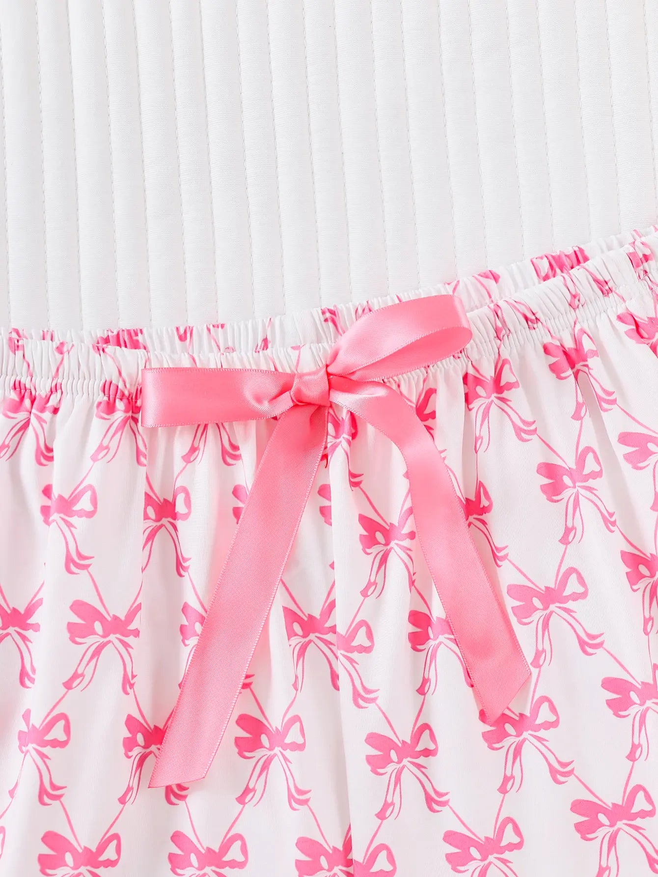 Women's 2-Piece Bow-Patterned Short-Sleeve Pajama Set with Button-Down Top and Coordinating Shorts for All-Season Comfort